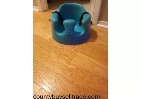 Bumbo seat with straps